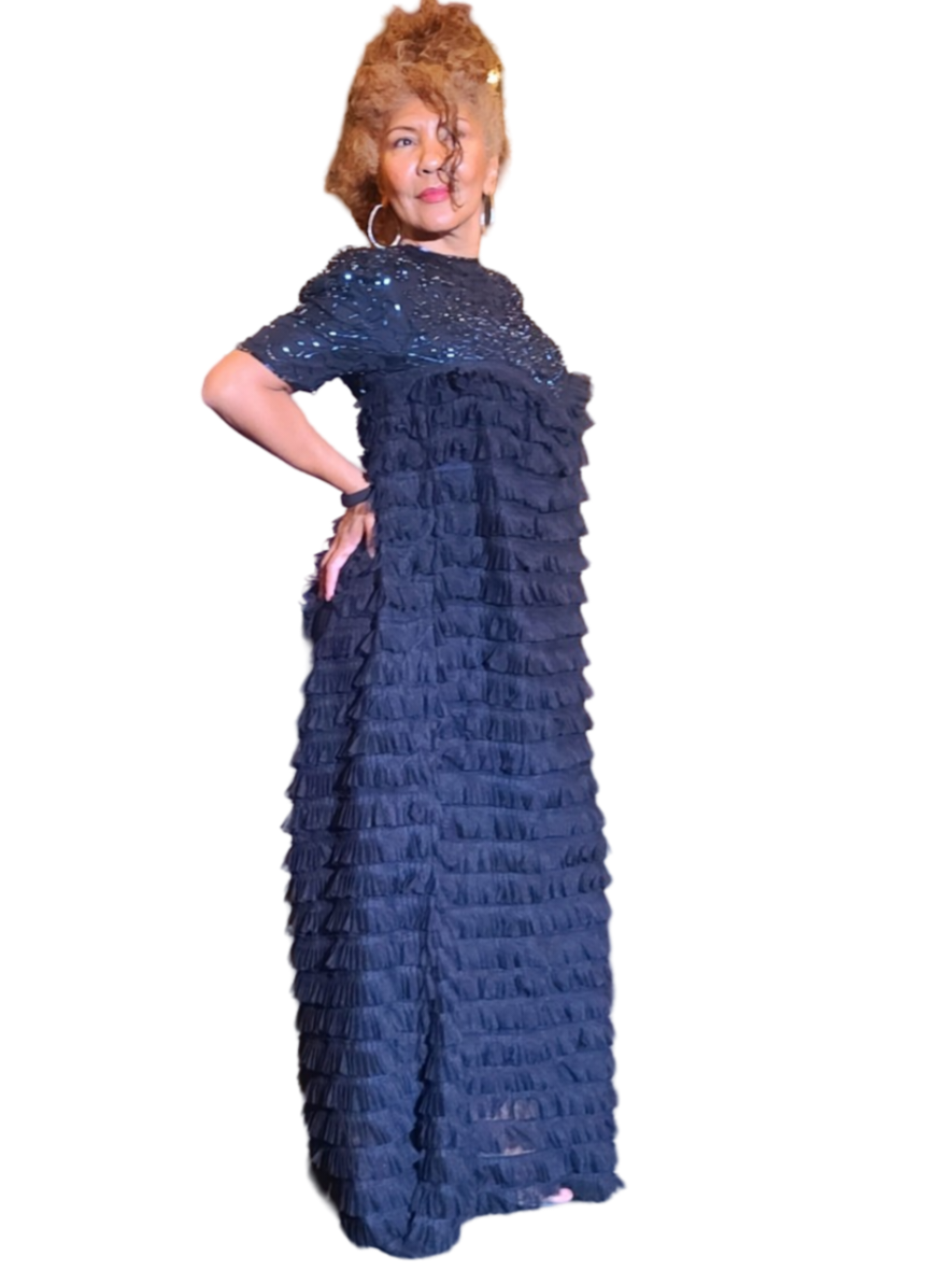 Unforgatable dresses are earth friendly. So shop with longetivity in mind and at the same time dress to achieve your goals. This sexy sheer dress is unforgettable. Floor length. Top has beautiful beads details with round neck. This dress is...