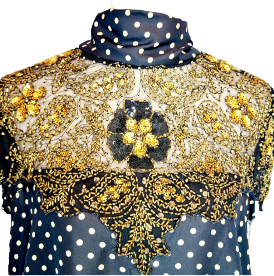 Adore Vintage Silk Dress. Yes, we adore sustainable fashion, like the clouds adore the sky. Let's be kind to Mother Earth. You will also adore this sparkling dress because it has gold beads and sequins, just exquisite. The turtle neck ties to the back..