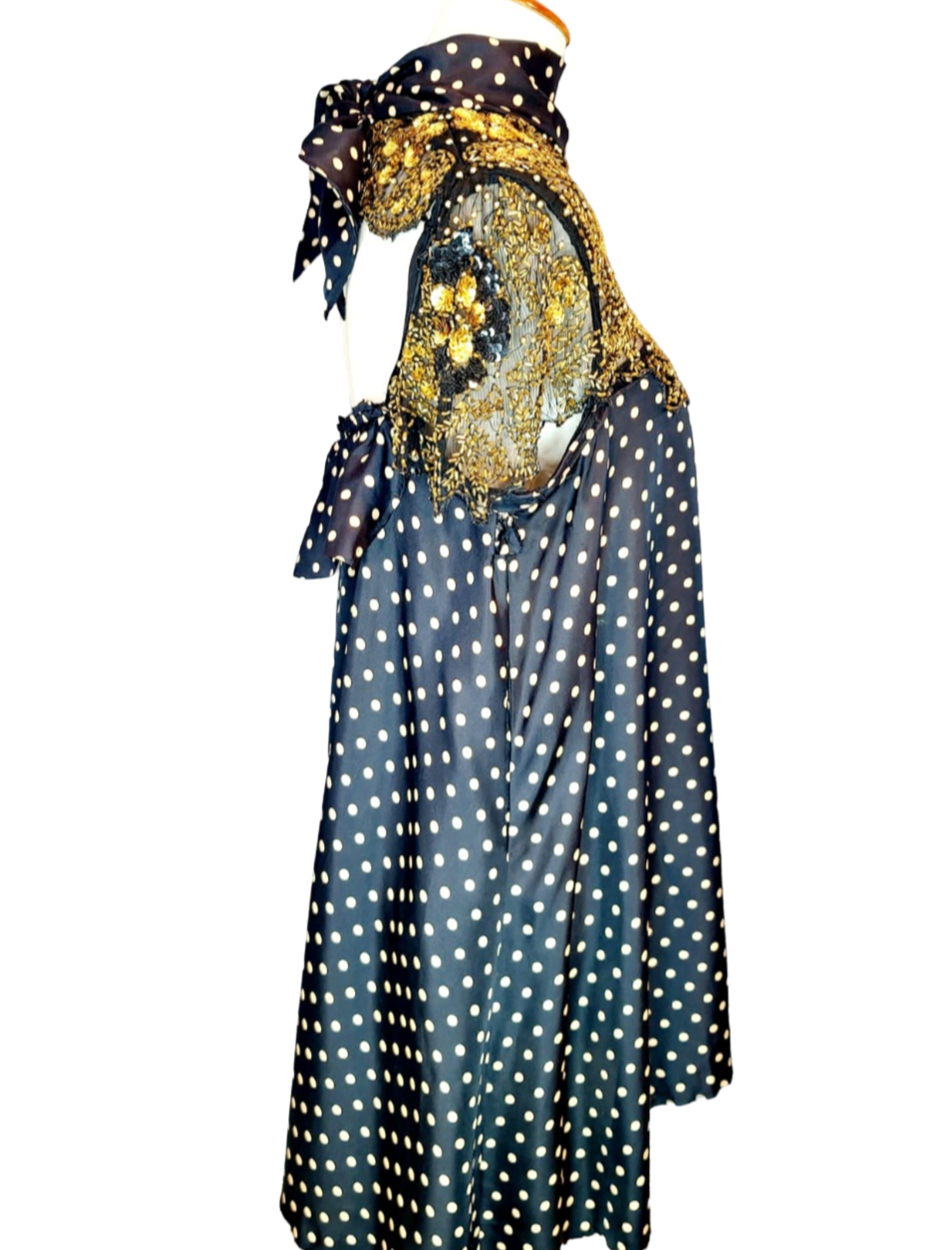 Adore Vintage Silk Dress. Yes, we adore sustainable fashion, like the clouds adore the sky. Let's be kind to Mother Earth. You will also adore this sparkling dress because it has gold beads and sequins, just exquisite. The turtle neck ties to the back..