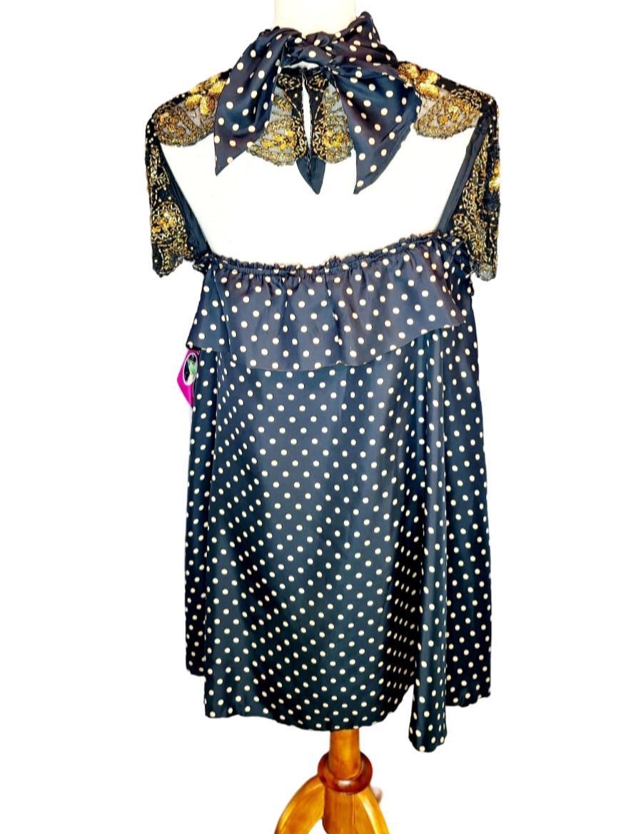 Adore Vintage Silk Dress. Yes, we adore sustainable fashion, like the clouds adore the sky. Let's be kind to Mother Earth. You will also adore this sparkling dress because it has gold beads and sequins, just exquisite. The turtle neck ties to the back..