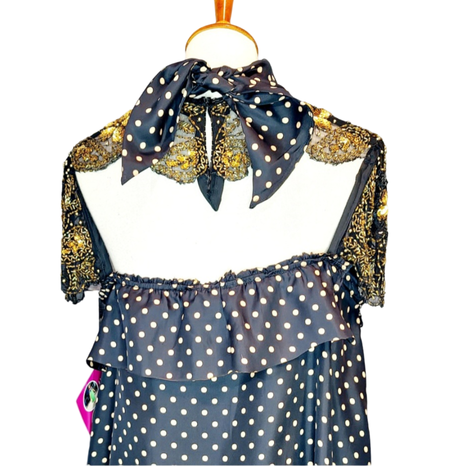 Adore Vintage Silk Dress. Yes, we adore sustainable fashion, like the clouds adore the sky. Let's be kind to Mother Earth. You will also adore this sparkling dress because it has gold beads and sequins, just exquisite. The turtle neck ties to the back..