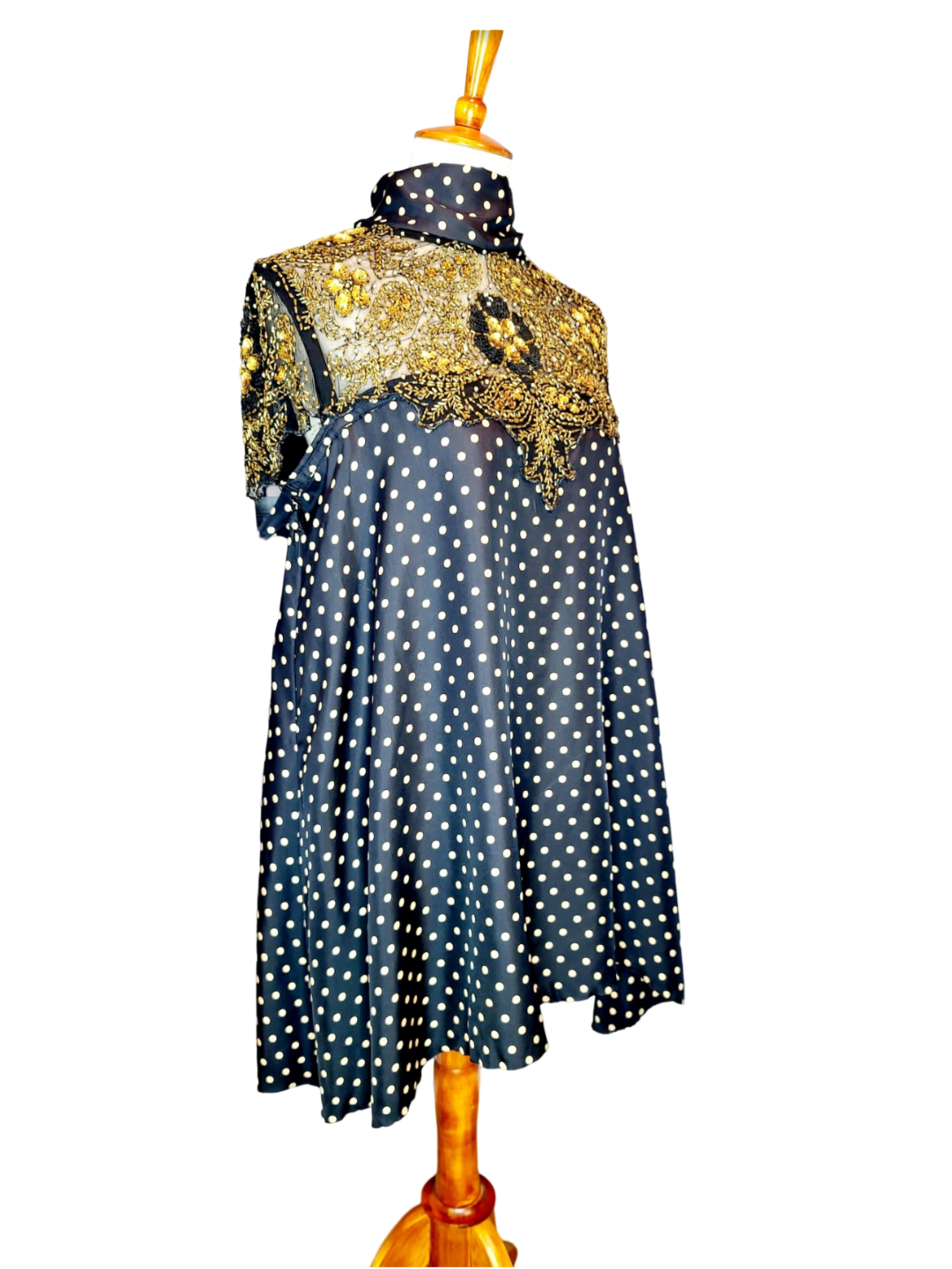 Adore Vintage Silk Dress. Yes, we adore sustainable fashion, like the clouds adore the sky. Let's be kind to Mother Earth. You will also adore this sparkling dress because it has gold beads and sequins, just exquisite. The turtle neck ties to the back..