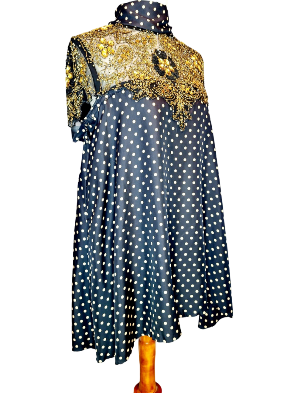 Adore Vintage Silk Dress. Yes, we adore sustainable fashion, like the clouds adore the sky. Let's be kind to Mother Earth. You will also adore this sparkling dress because it has gold beads and sequins, just exquisite. The turtle neck ties to the back..