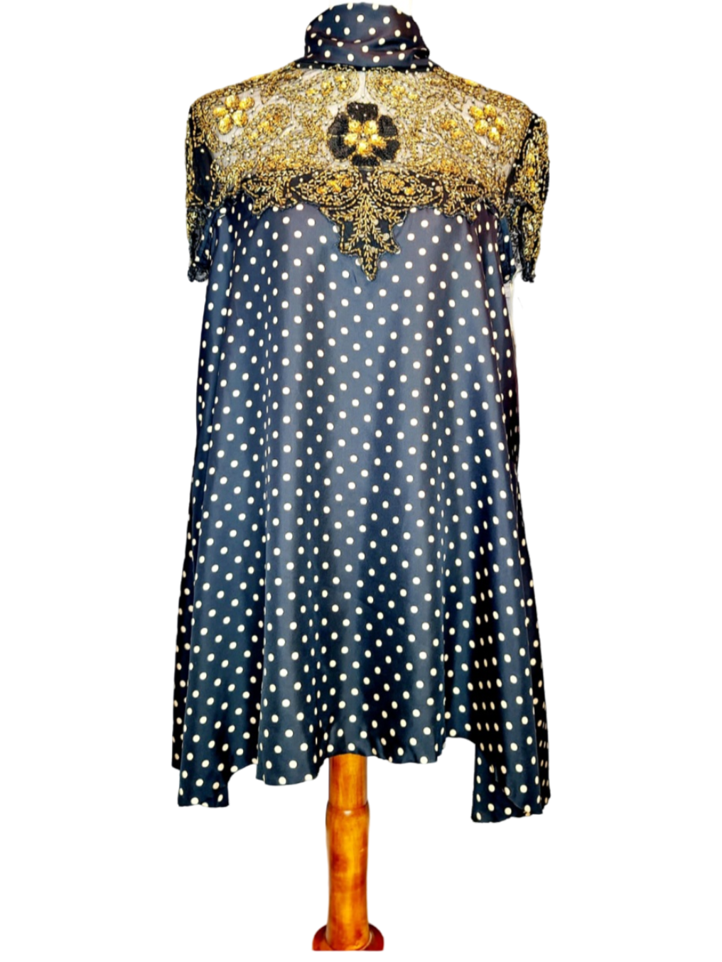 Adore Vintage Silk Dress. Yes, we adore sustainable fashion, like the clouds adore the sky. Let's be kind to Mother Earth. You will also adore this sparkling dress because it has gold beads and sequins, just exquisite. The turtle neck ties to the back..