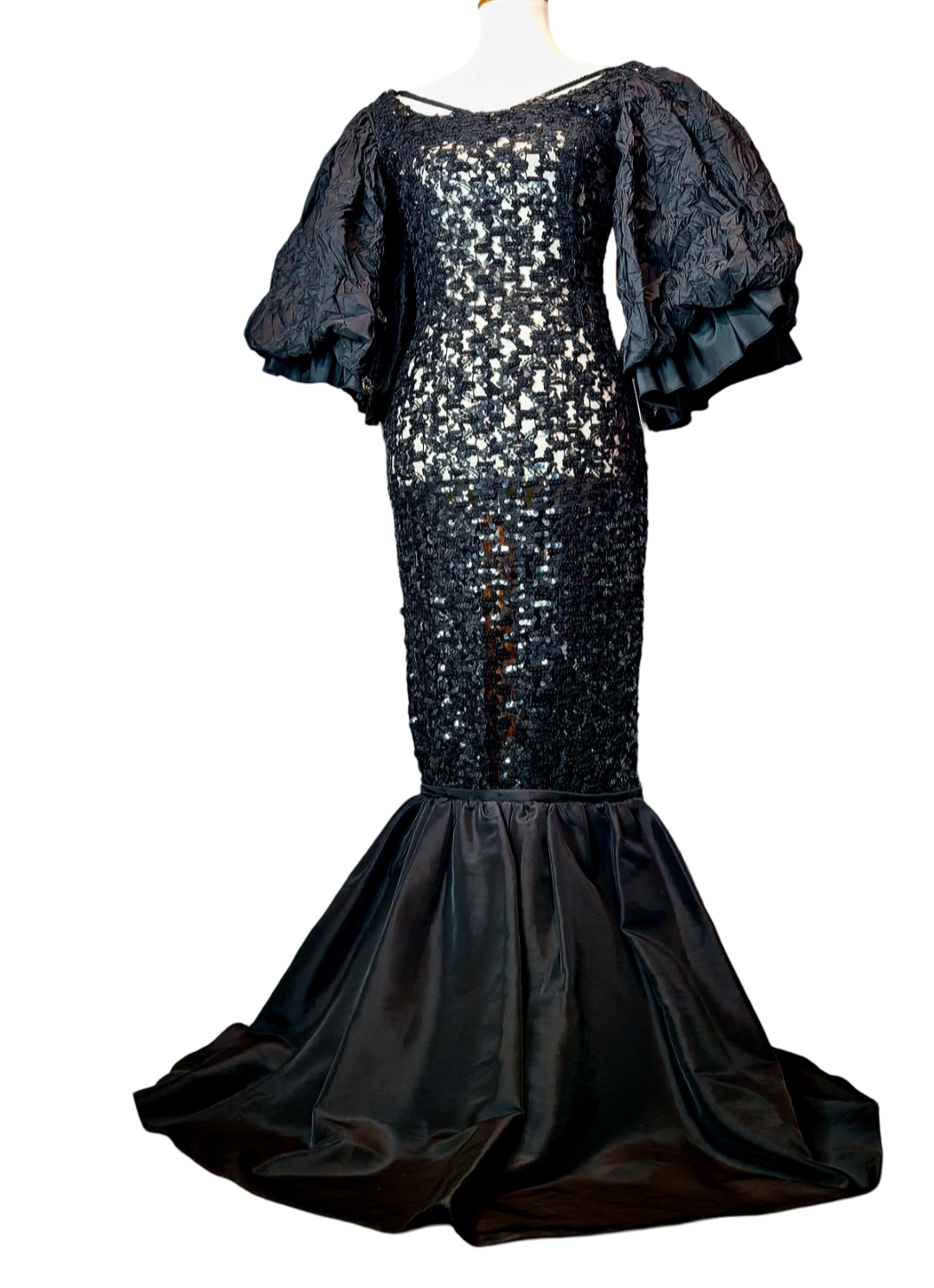 Campana Mermaid Dress. Couture sophisticated. Red carpet look. We love everything about this dress. Screams sophisticated. Mermaid dress with big ruffle sleeves. See through, add your undergarment to your liking. It's all in the details...