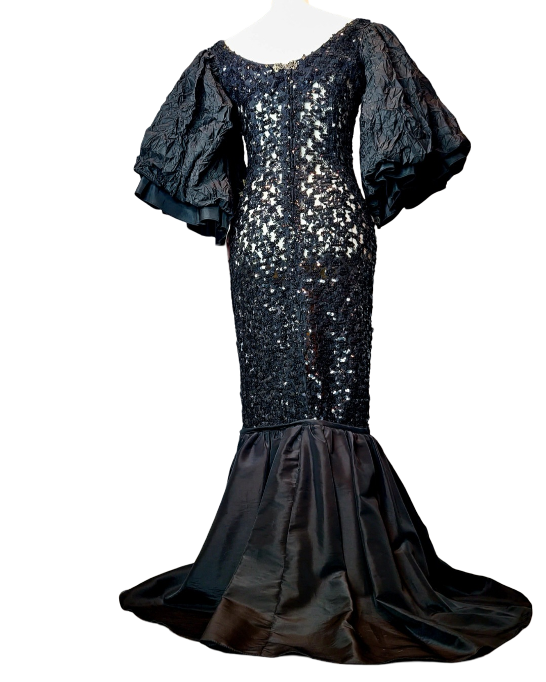 Campana Mermaid Dress. Couture sophisticated. Red carpet look. We love everything about this dress. Screams sophisticated. Mermaid dress with big ruffle sleeves. See through, add your undergarment to your liking. It's all in the details...
