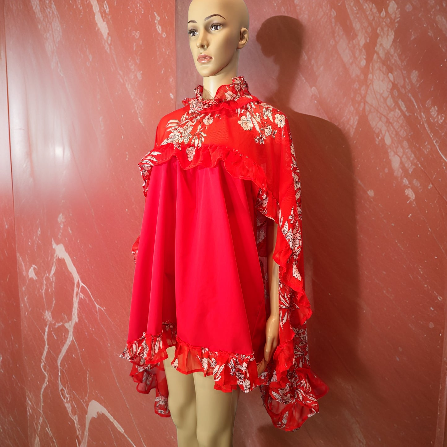 Florida Butterfly Top. Introducing our Butterfly Top-a unique and playful addition to your wardrobe. This stunning red top features elegant ruffles that will make you stand out from the crowd. With this one-of-a-kind design, this top is perfect...