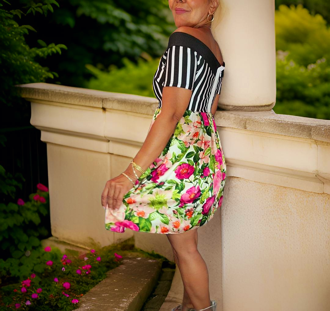 Discover Tell me a Story - a dress that combines the latest trends with vintage charm. Made with unique, sustainable fabrics, this one-of-a-kind piece will turn heads and spark conversation. Buy less, buy better, and feel good knowing you're wearing