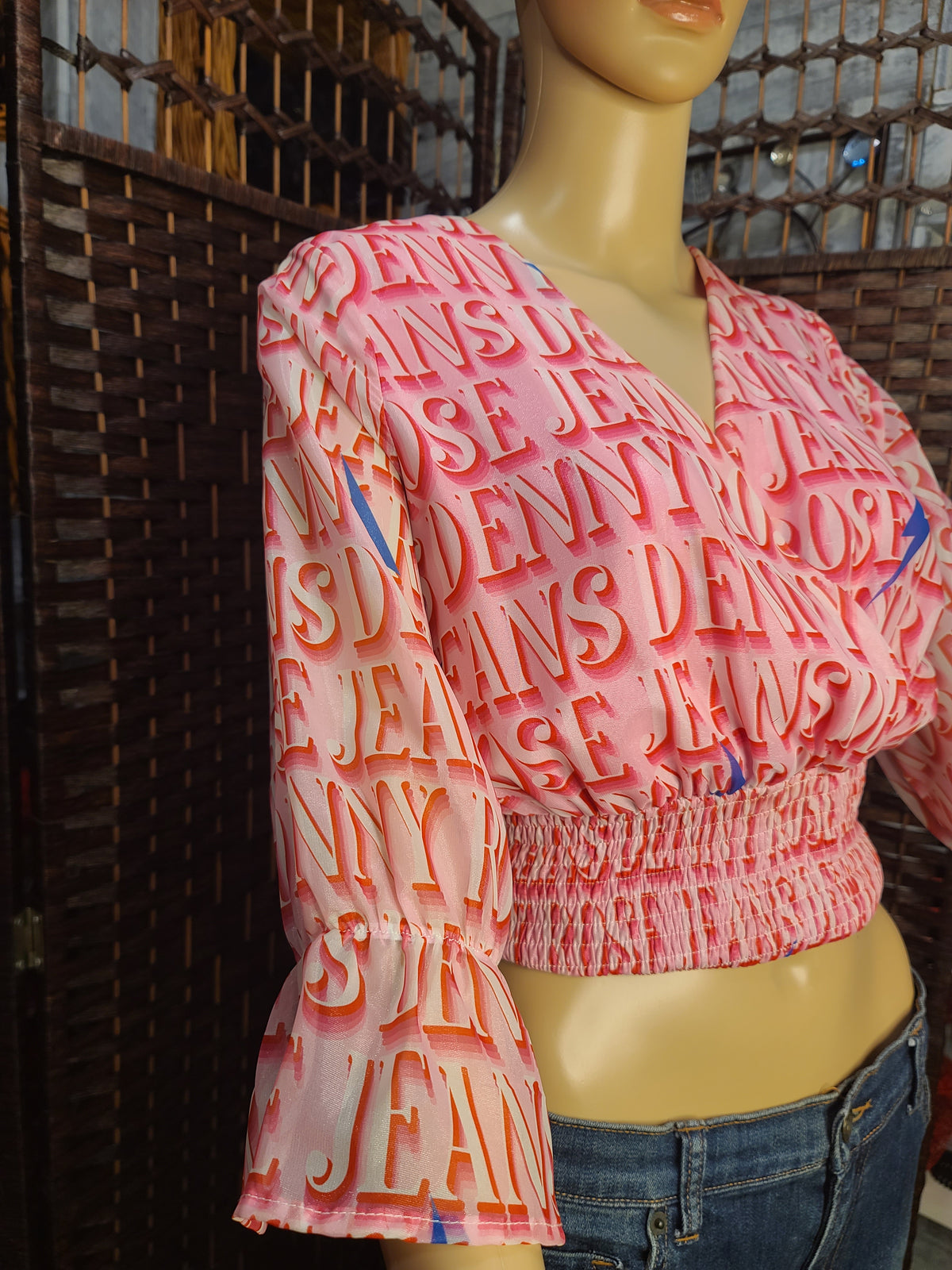 Pink Graphic Wrap-Style Crop Top | Statement Bell Sleeves | Smocked Waist