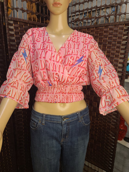 Pink Graphic Wrap-Style Crop Top | Statement Bell Sleeves | Smocked Waist