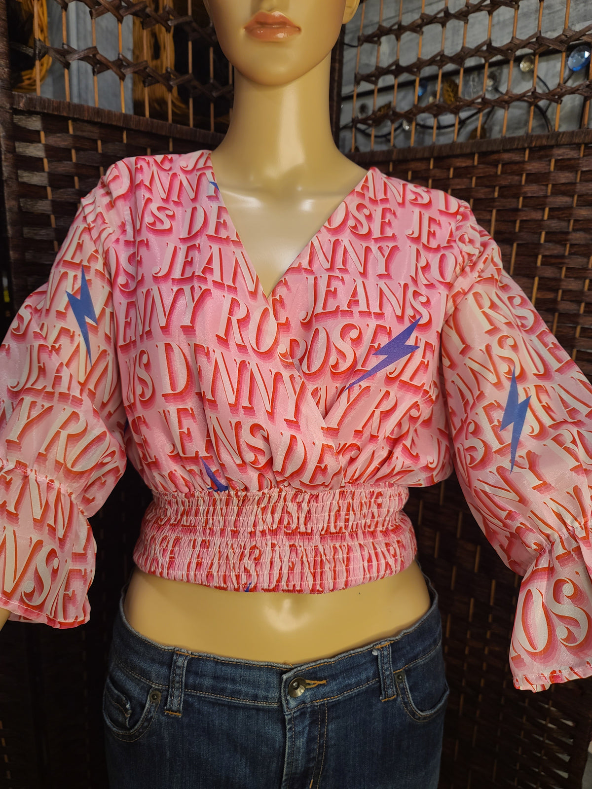 Pink Graphic Wrap-Style Crop Top | Statement Bell Sleeves | Smocked Waist