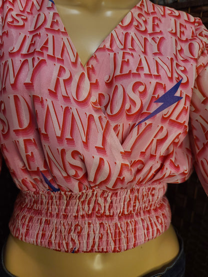 Pink Graphic Wrap-Style Crop Top | Statement Bell Sleeves | Smocked Waist